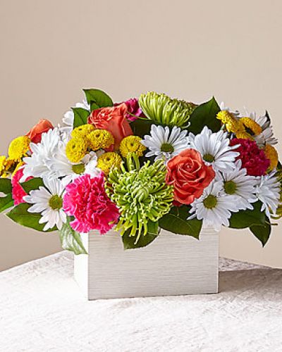 <p>What's the scoop on this bright arrangement Well, our Sorbet Bouquet is curated with a full serving of freshness and fragrance by our local florists to make anyone's day sweeter. This design features roses, spider mums, carnations and poms in a whitewashed wooden box.</p>